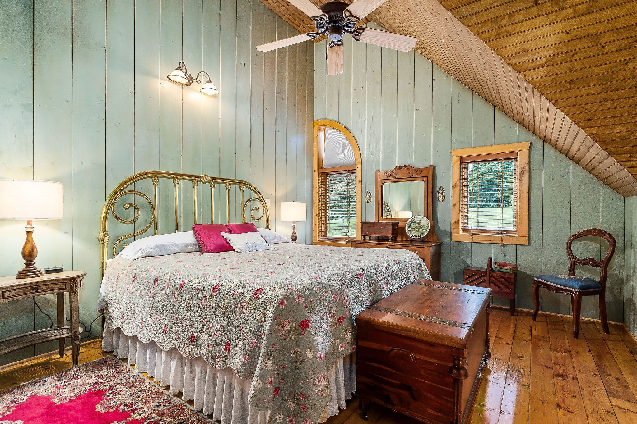 4042 Rocky Ridge Road Doyle, TN 38559 - Photo 52 of 85 a bedroom with bed and a chandelier