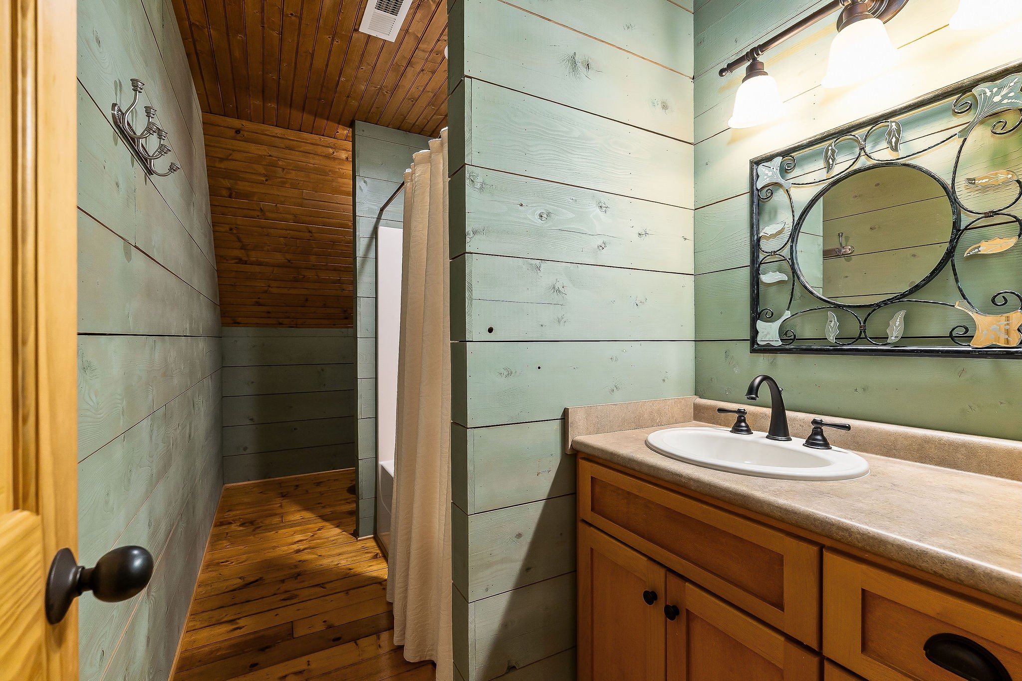 4042 Rocky Ridge Road Doyle, TN 38559 - Photo 55 of 85 a bathroom with a sink and a mirror