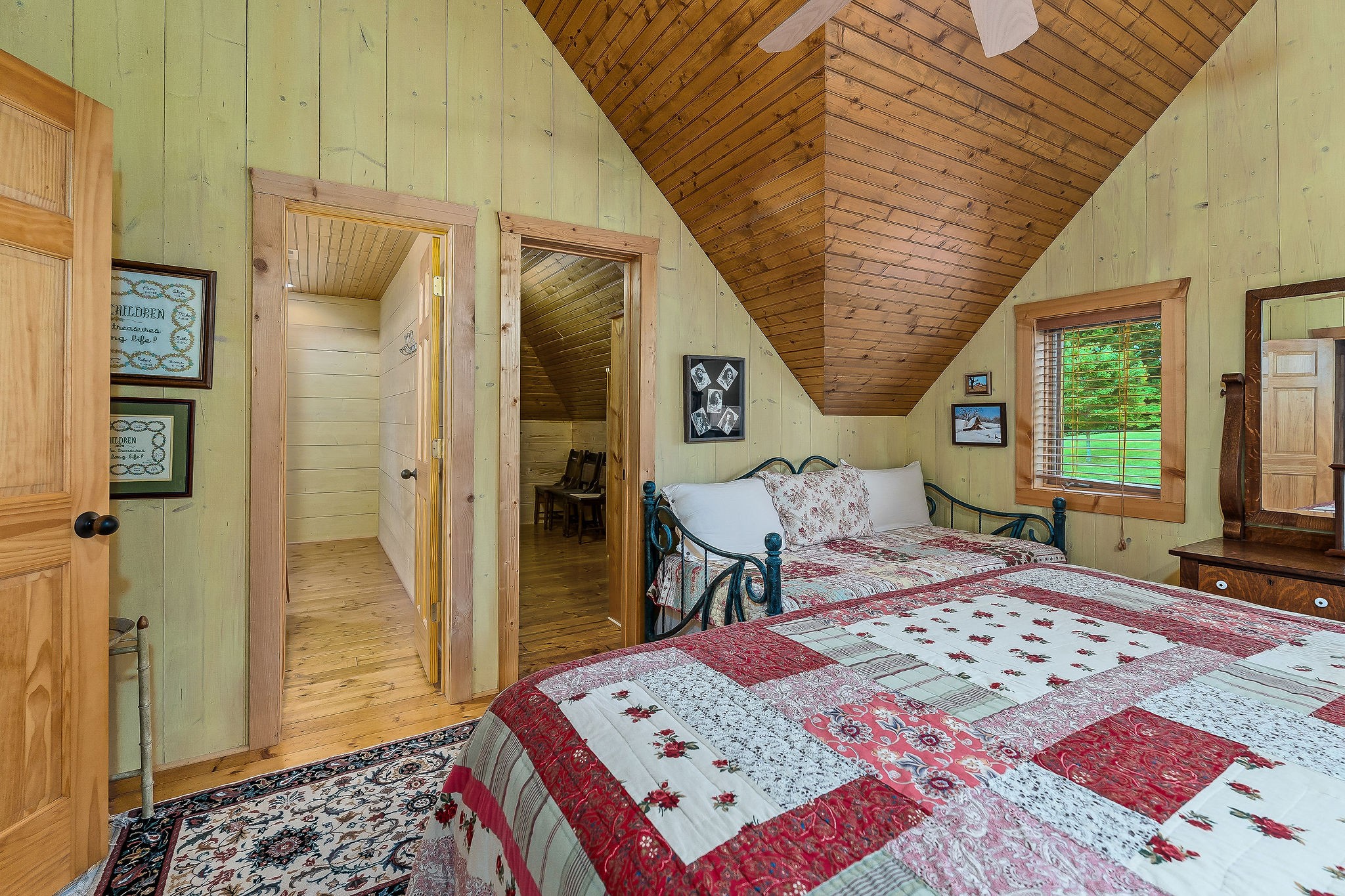 4042 Rocky Ridge Road Doyle, TN 38559 - Photo 57 of 85 a bedroom with a bed a rug and a large window