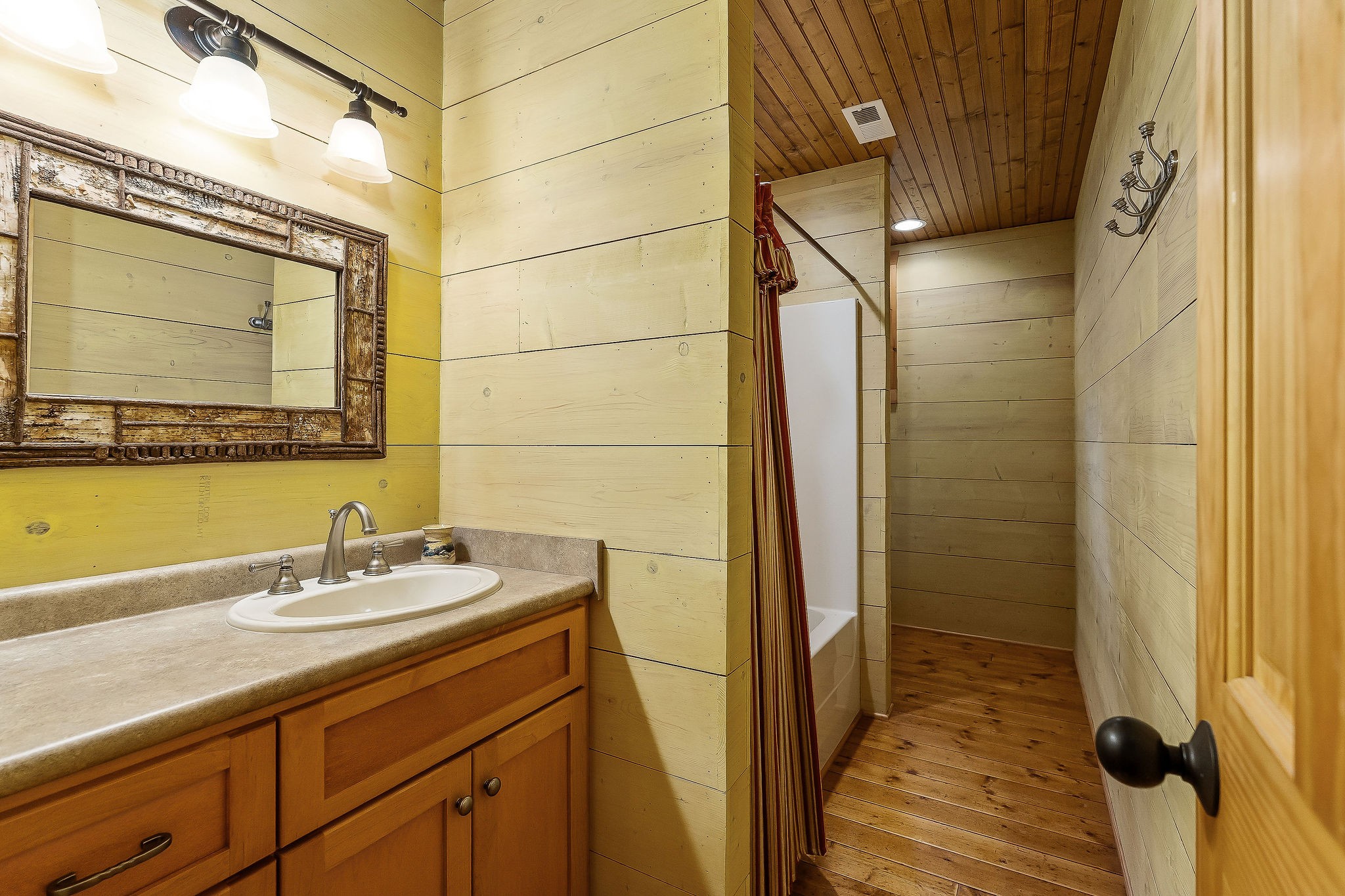 4042 Rocky Ridge Road Doyle, TN 38559 - Photo 59 of 85 a bathroom with a sink and a mirror