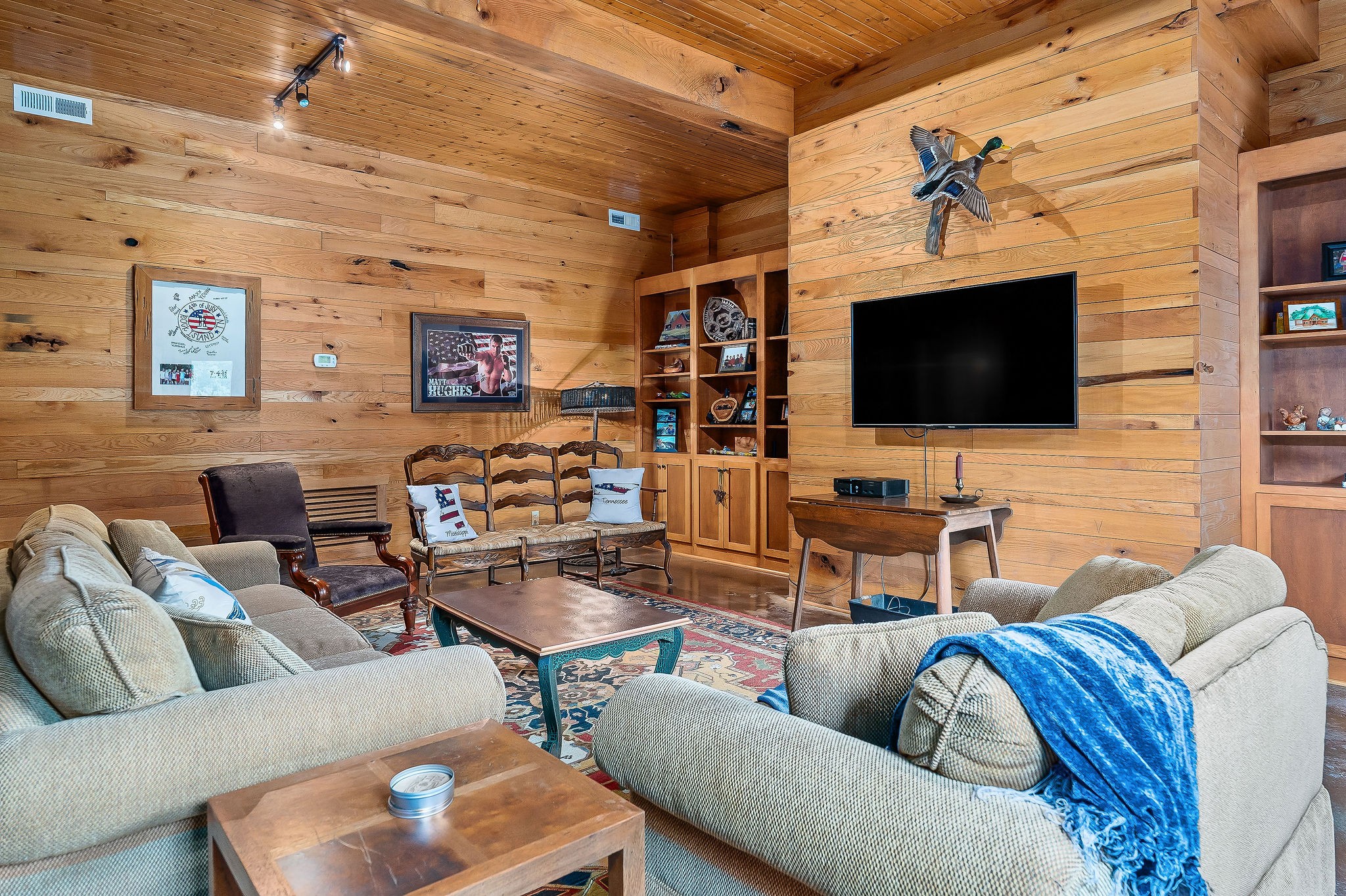 4042 Rocky Ridge Road Doyle, TN 38559 - Photo 66 of 85 a living room with furniture and a flat screen tv