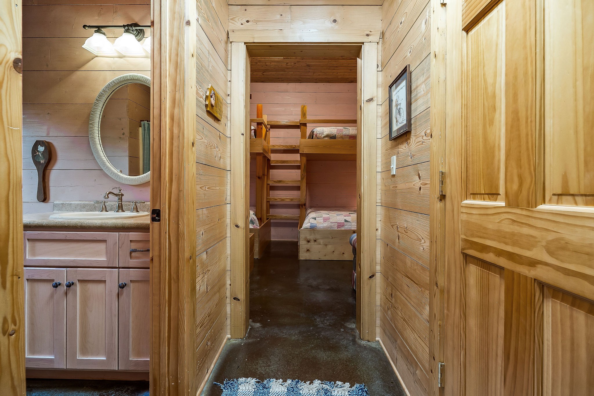 4042 Rocky Ridge Road Doyle, TN 38559 - Photo 70 of 85 a bathroom with a sink a mirror and a shower