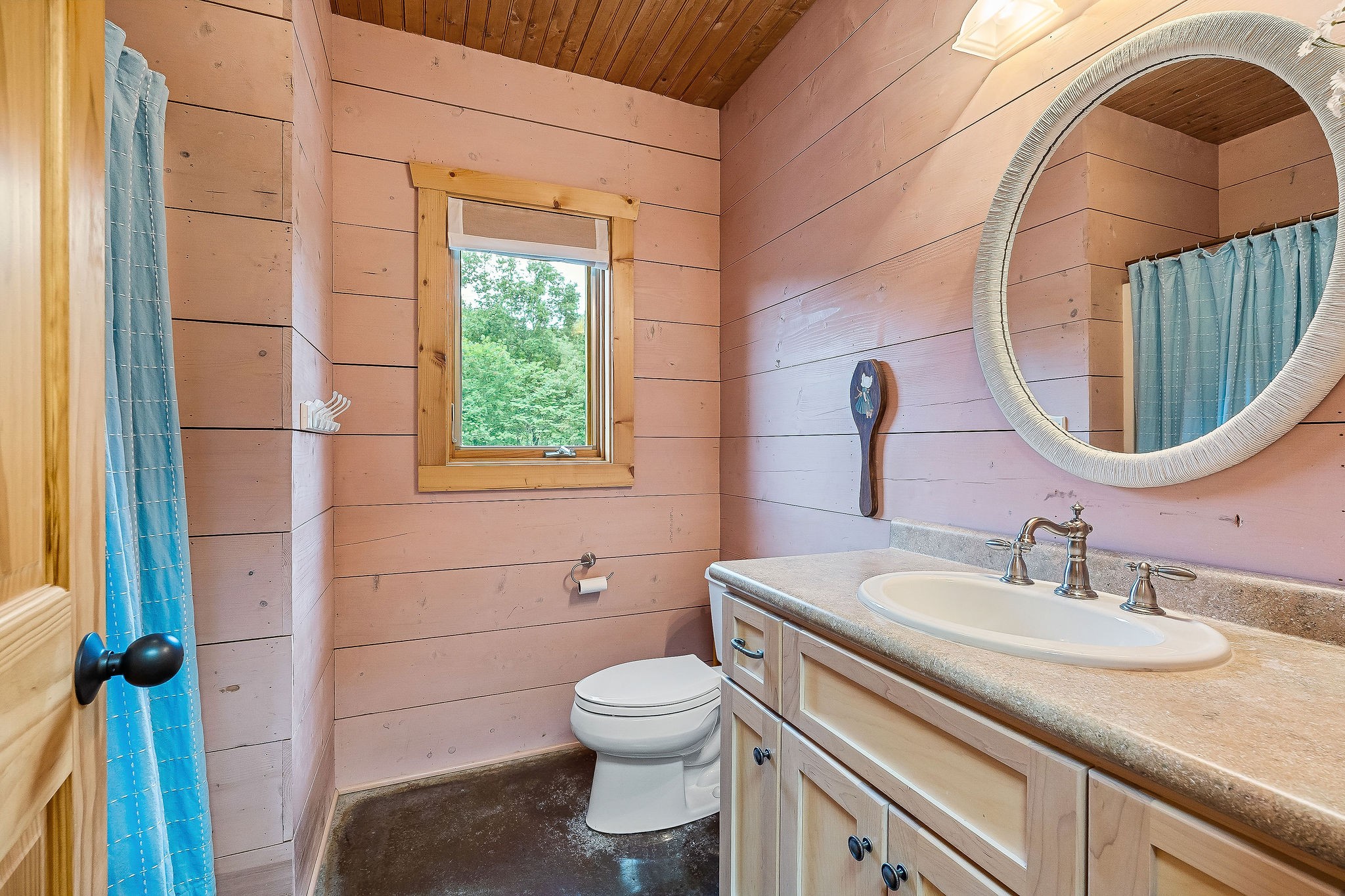 4042 Rocky Ridge Road Doyle, TN 38559 - Photo 71 of 85 a bathroom with a granite countertop toilet sink and mirror