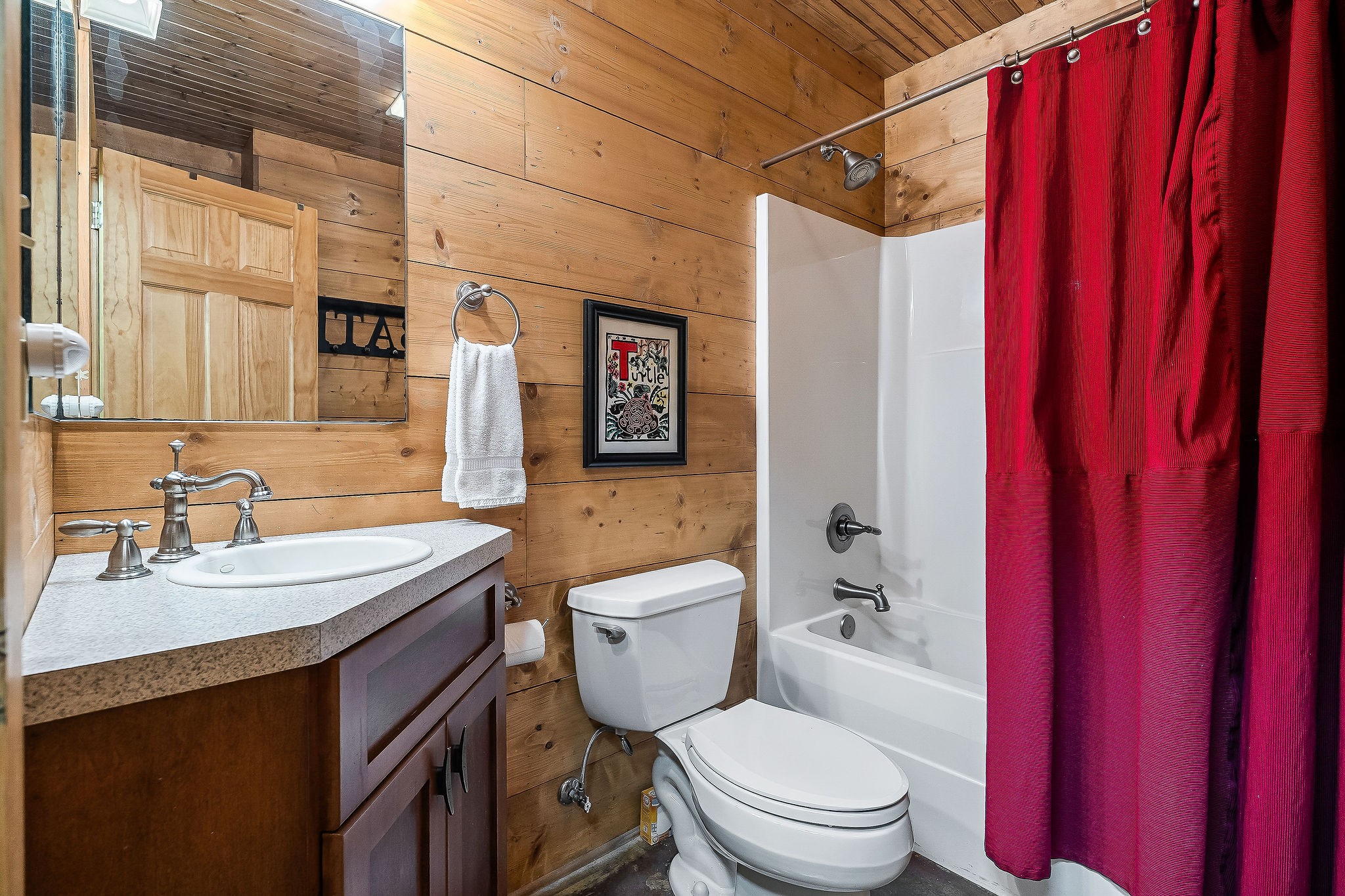 4042 Rocky Ridge Road Doyle, TN 38559 - Photo 74 of 85 a bathroom with a sink a toilet a mirror and shower