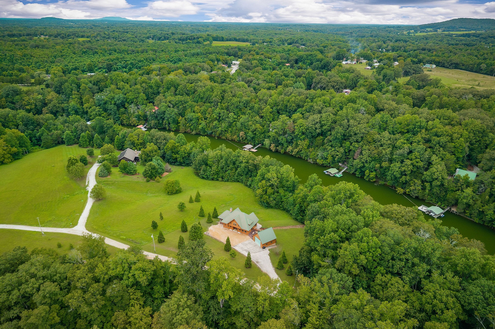 4042 Rocky Ridge Road Doyle, TN 38559 - Photo 81 of 85 a view of a big yard with large trees