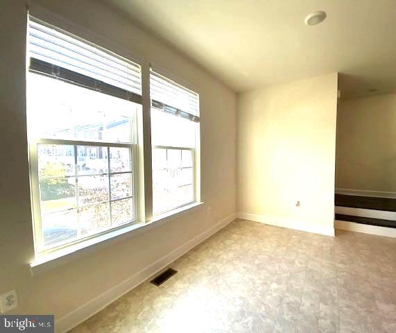 10726 Shadewell Spring Way Manassas, VA 20112 - Photo 14 of 29 an empty room with a window