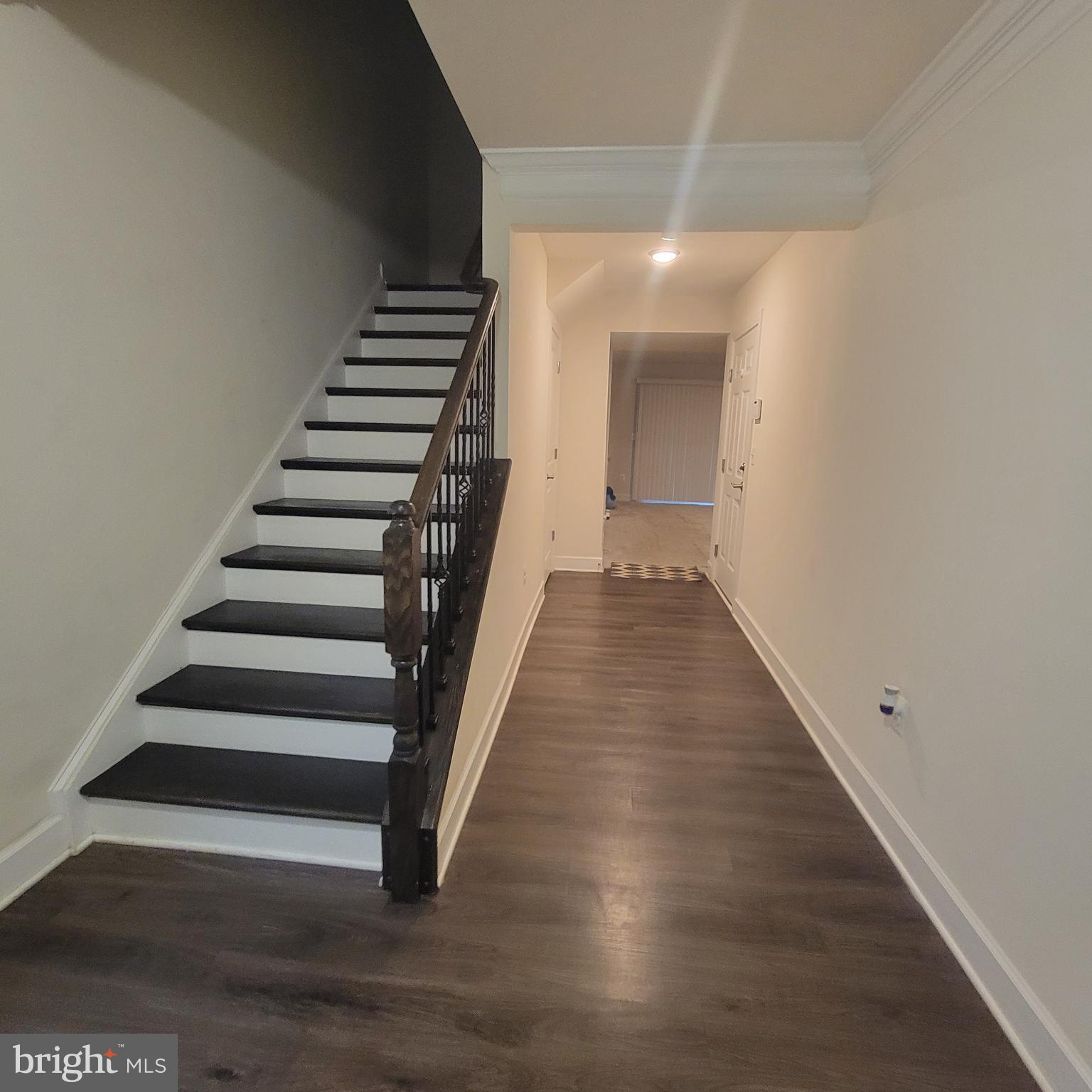 10726 Shadewell Spring Way Manassas, VA 20112 - Photo 2 of 29 a view of entryway with wooden floor