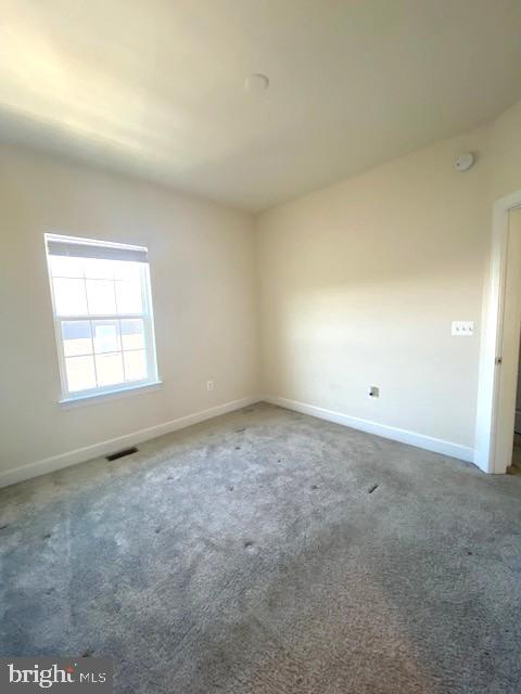 10726 Shadewell Spring Way Manassas, VA 20112 - Photo 22 of 29 an empty room with a window