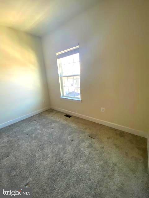 10726 Shadewell Spring Way Manassas, VA 20112 - Photo 23 of 29 an empty room with a window