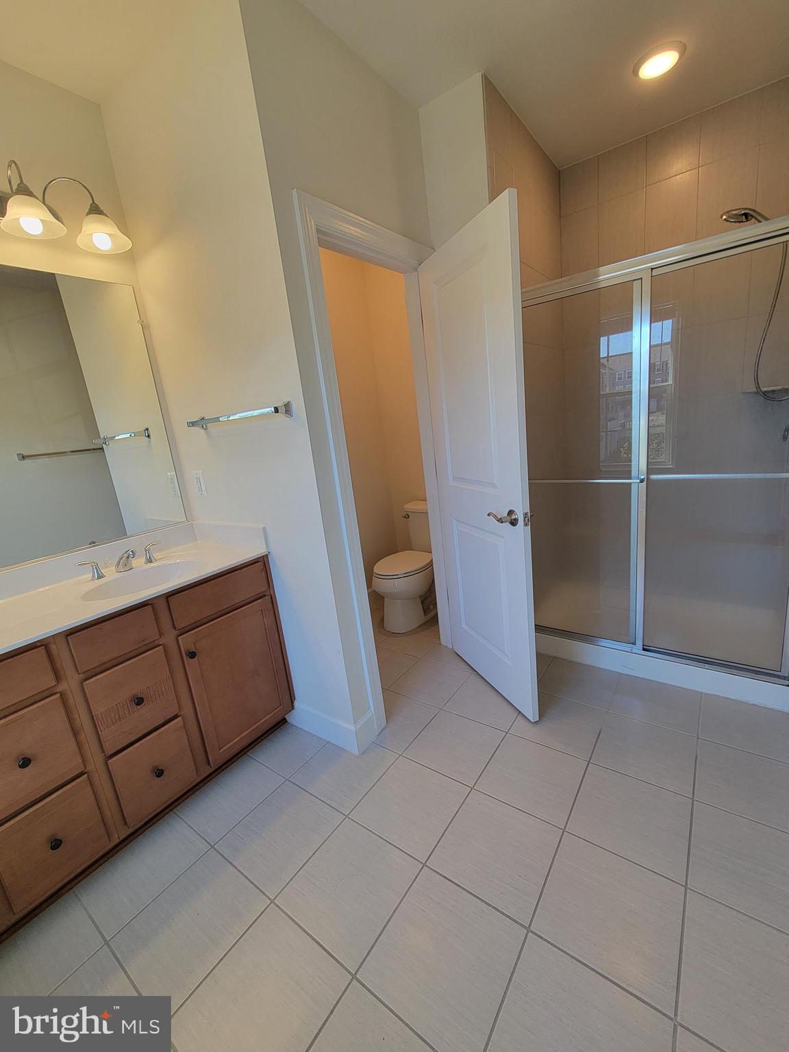 10726 Shadewell Spring Way Manassas, VA 20112 - Photo 25 of 29 a view of a walk in closet