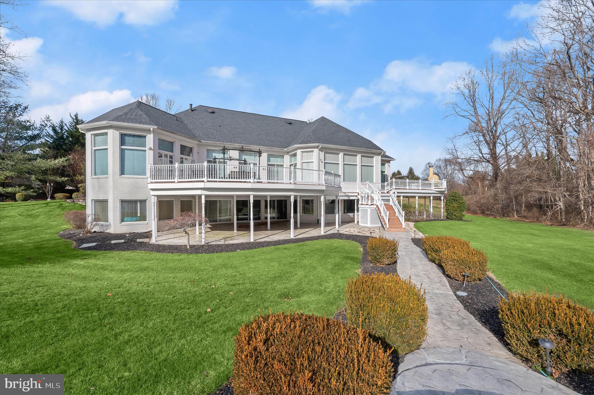 11678 Frederick Road Ellicott City, MD 21042 - Photo 100 of 118 a view of a house with a yard and sitting area
