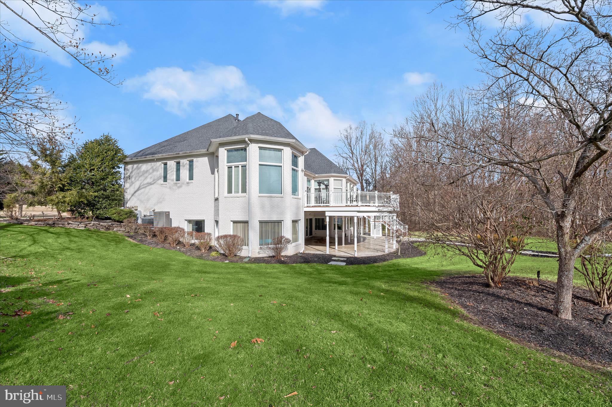 11678 Frederick Road Ellicott City, MD 21042 - Photo 110 of 118 a view of a house with a big yard and large trees