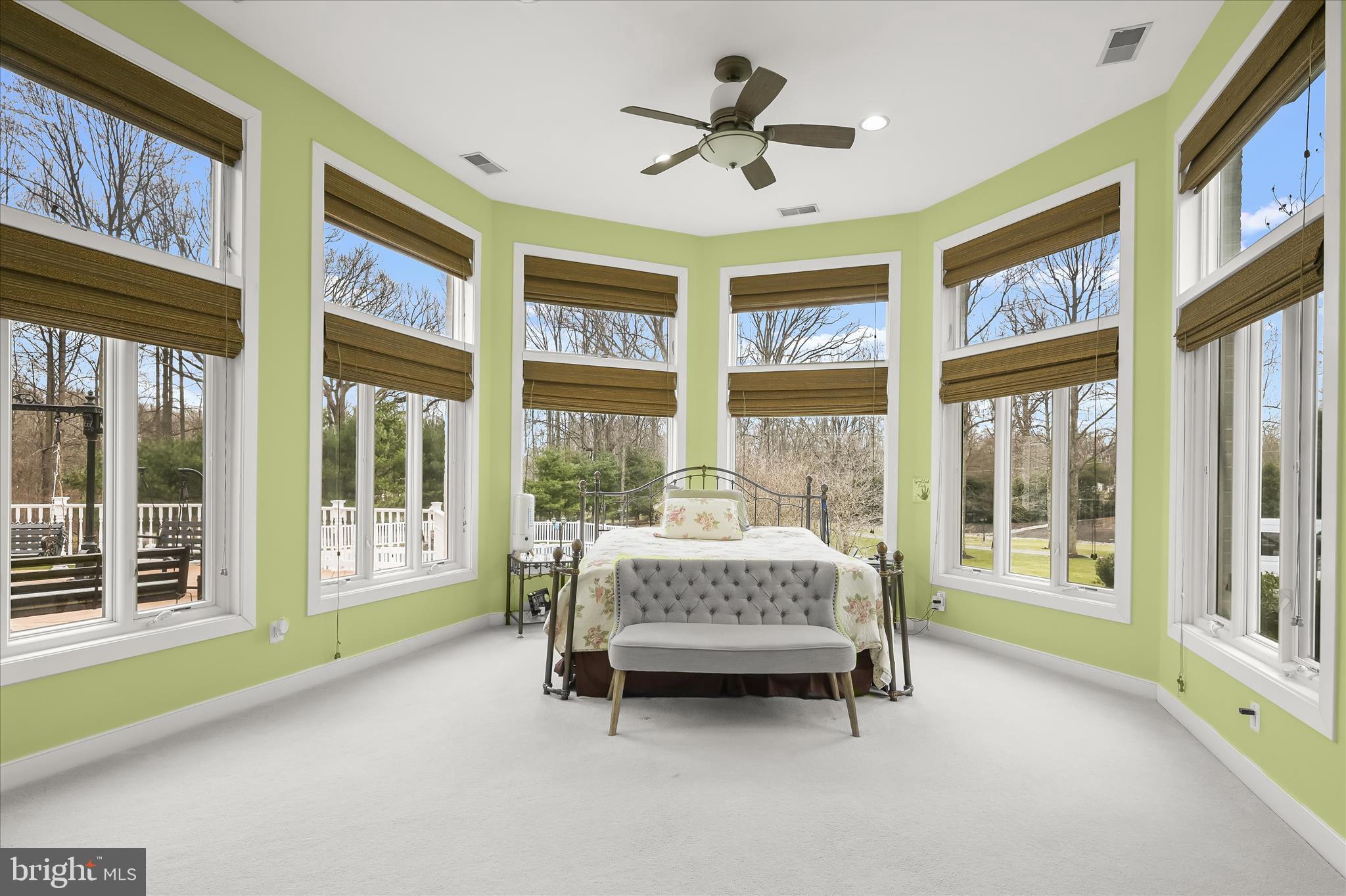 11678 Frederick Road Ellicott City, MD 21042 - Photo 26 of 118 a bed sitting in a spacious bedroom next to a large window