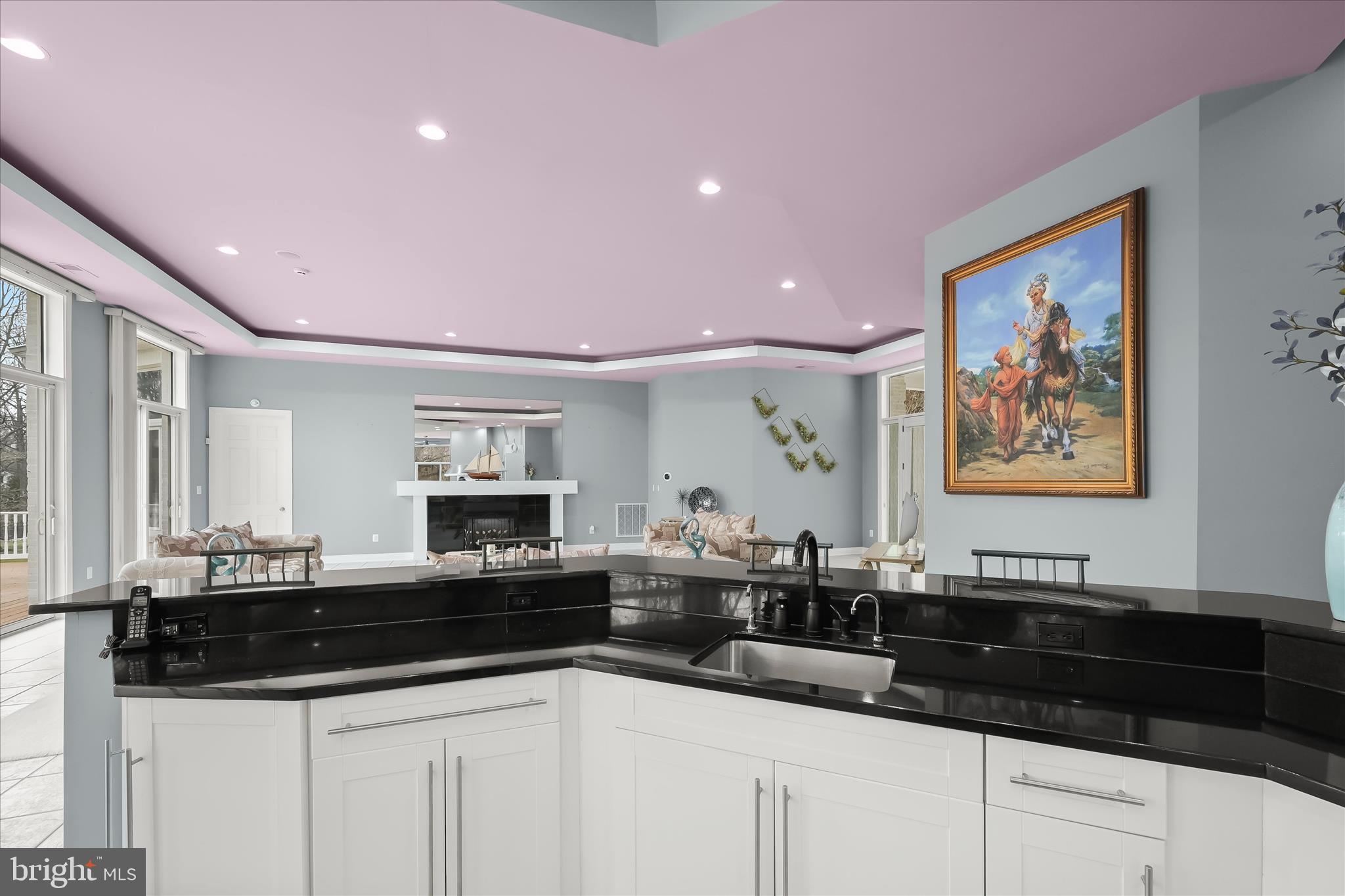 11678 Frederick Road Ellicott City, MD 21042 - Photo 42 of 118 a kitchen with granite countertop a sink and cabinets