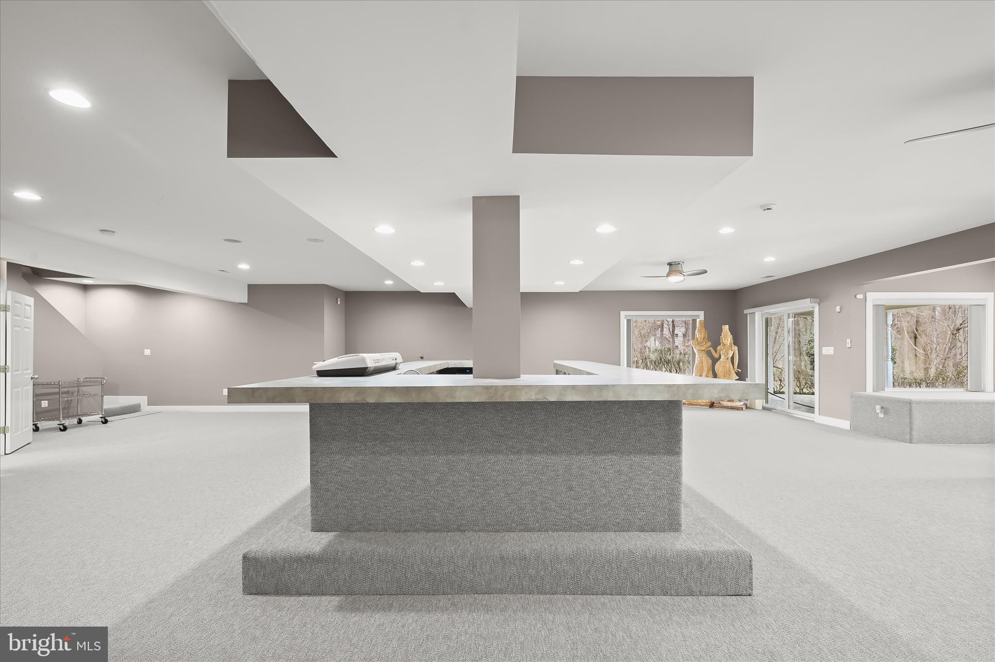 11678 Frederick Road Ellicott City, MD 21042 - Photo 79 of 118 a large kitchen with stainless steel appliances kitchen island a large counter top a sink a stove and a refrigerator