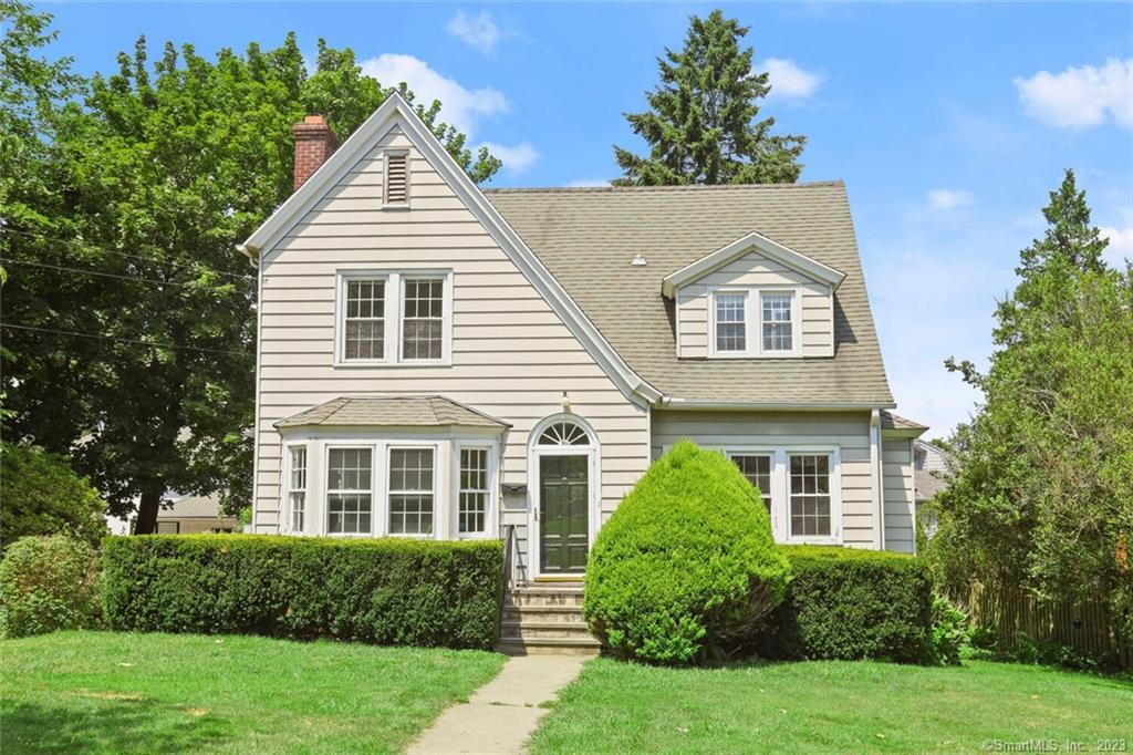 20 Chesterfield Road Stamford, CT 06902 - Photo 1 of 1 front view of a house and a yard