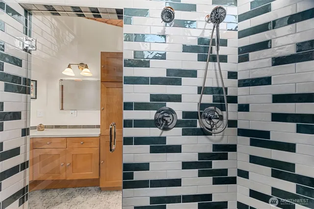 a view of a room with lots of stuff and hardwood floor