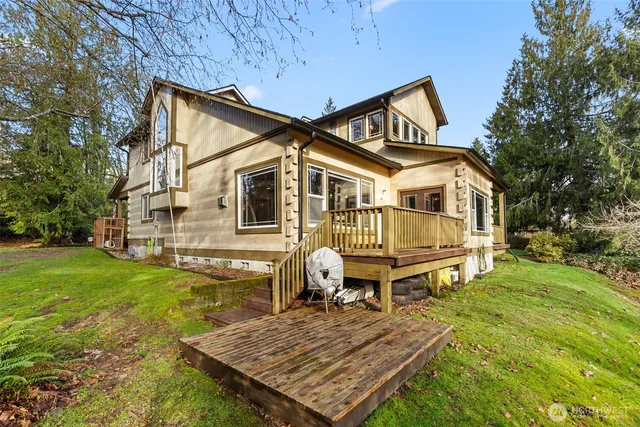 a view of a balcony with wooden floor