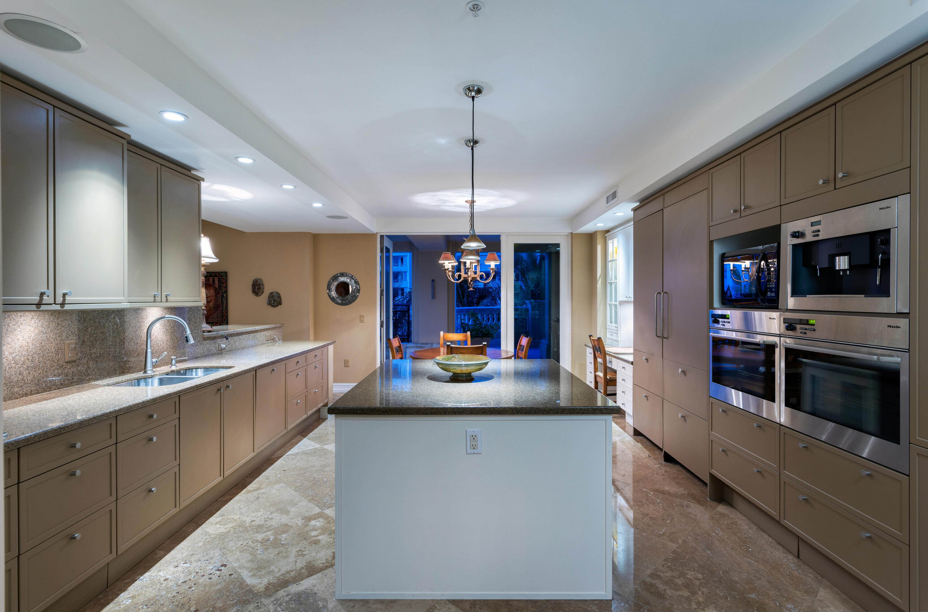 400 South Ocean Boulevard, Unit R14 Boca Raton, FL 33432 - Photo 8 of 29 KITCHEN TO OUTDOOR TERRACE