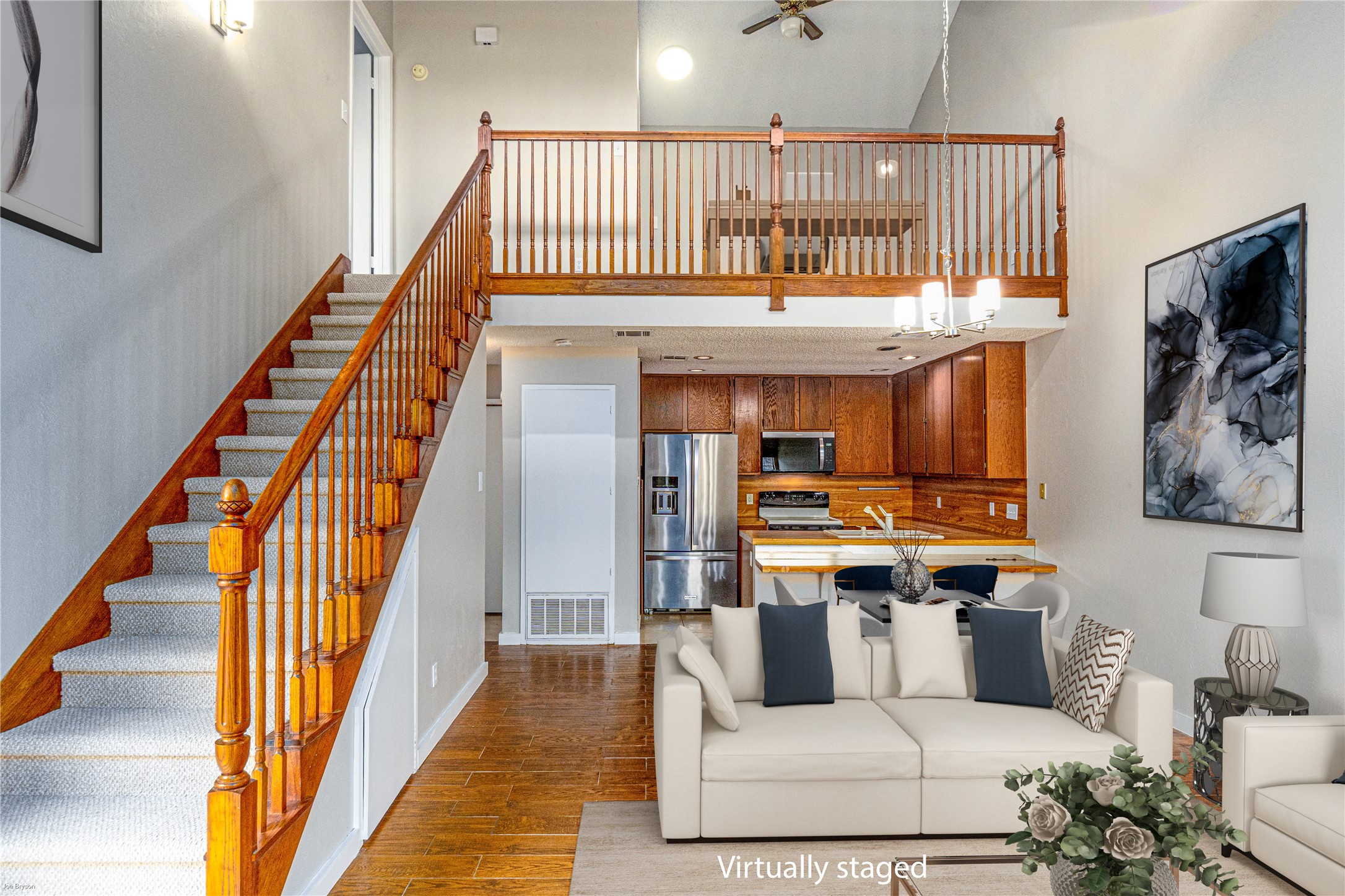 1748 Ohlen Road, Unit 3 Austin, TX 78757 - Photo 10 of 30 Up the stairs to another primary bedroom, primary bath, and office area!