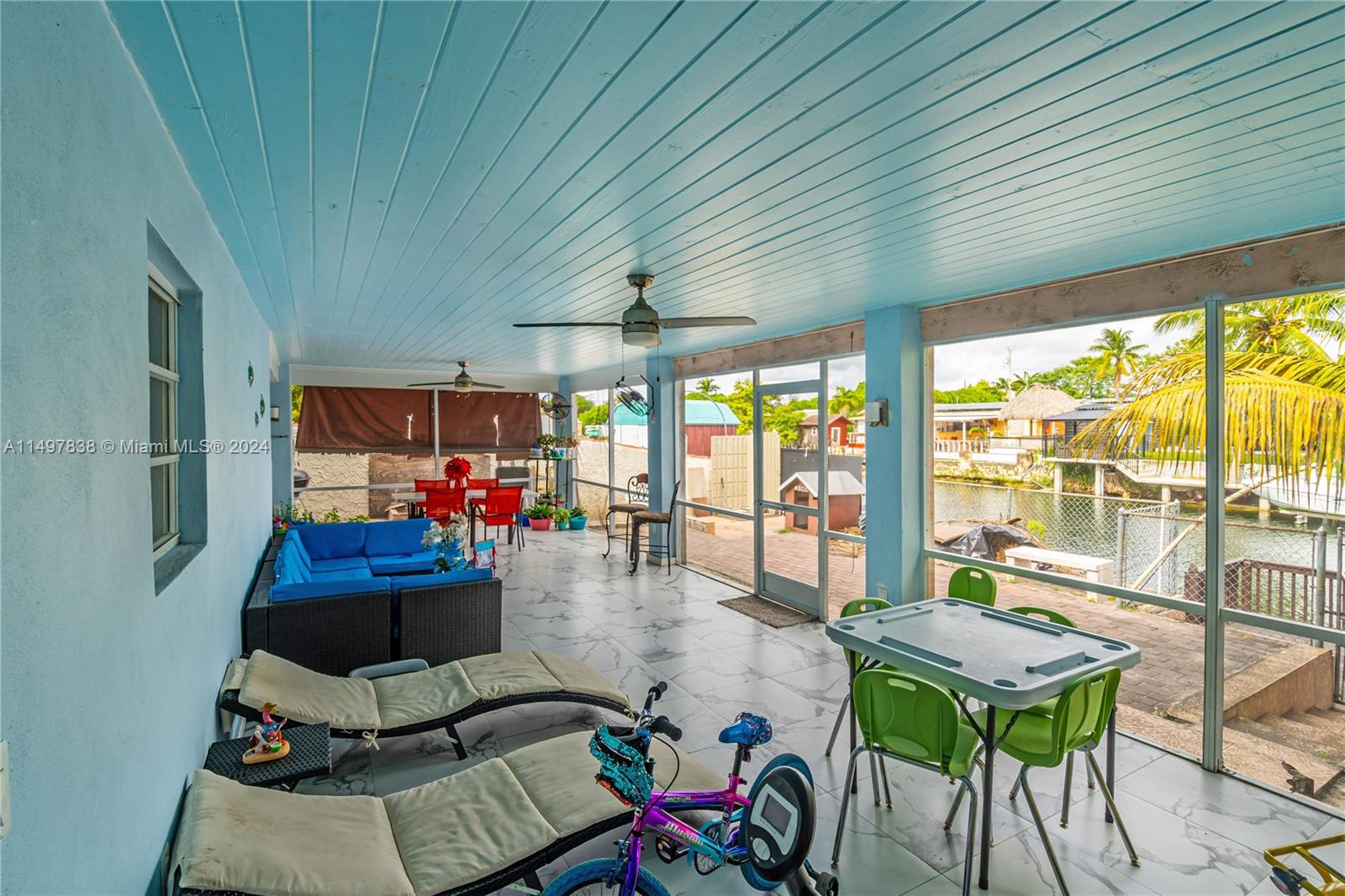 10981 Southwest 44th Street Miami, FL 33165 - Photo 43 of 52 a room with furniture and a large window