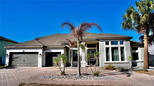 a view of a house with a patio