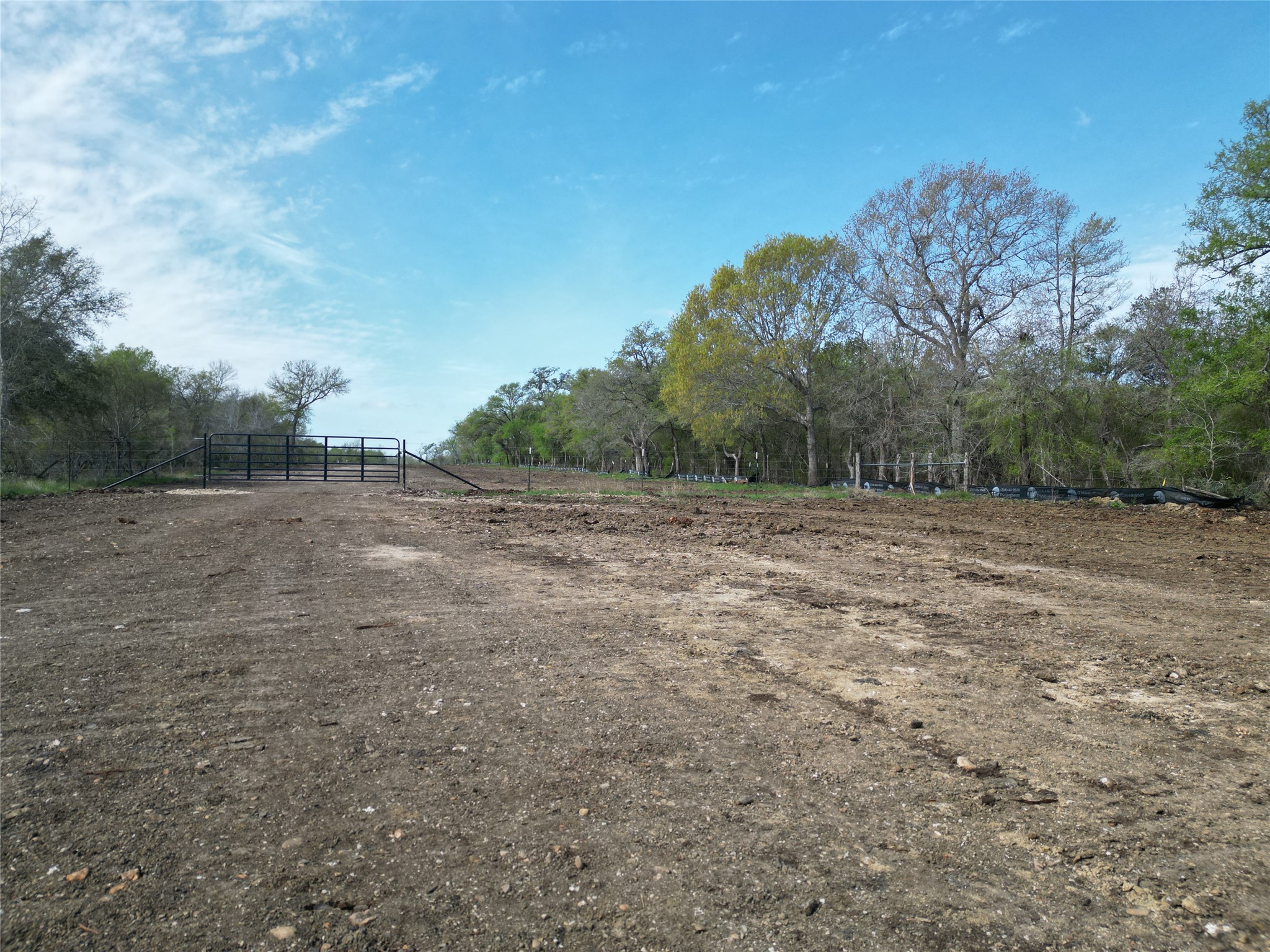 Tbd Cunningham Drive Lockhart, TX 78644 - Photo 12 of 15 a view of a field with trees in background