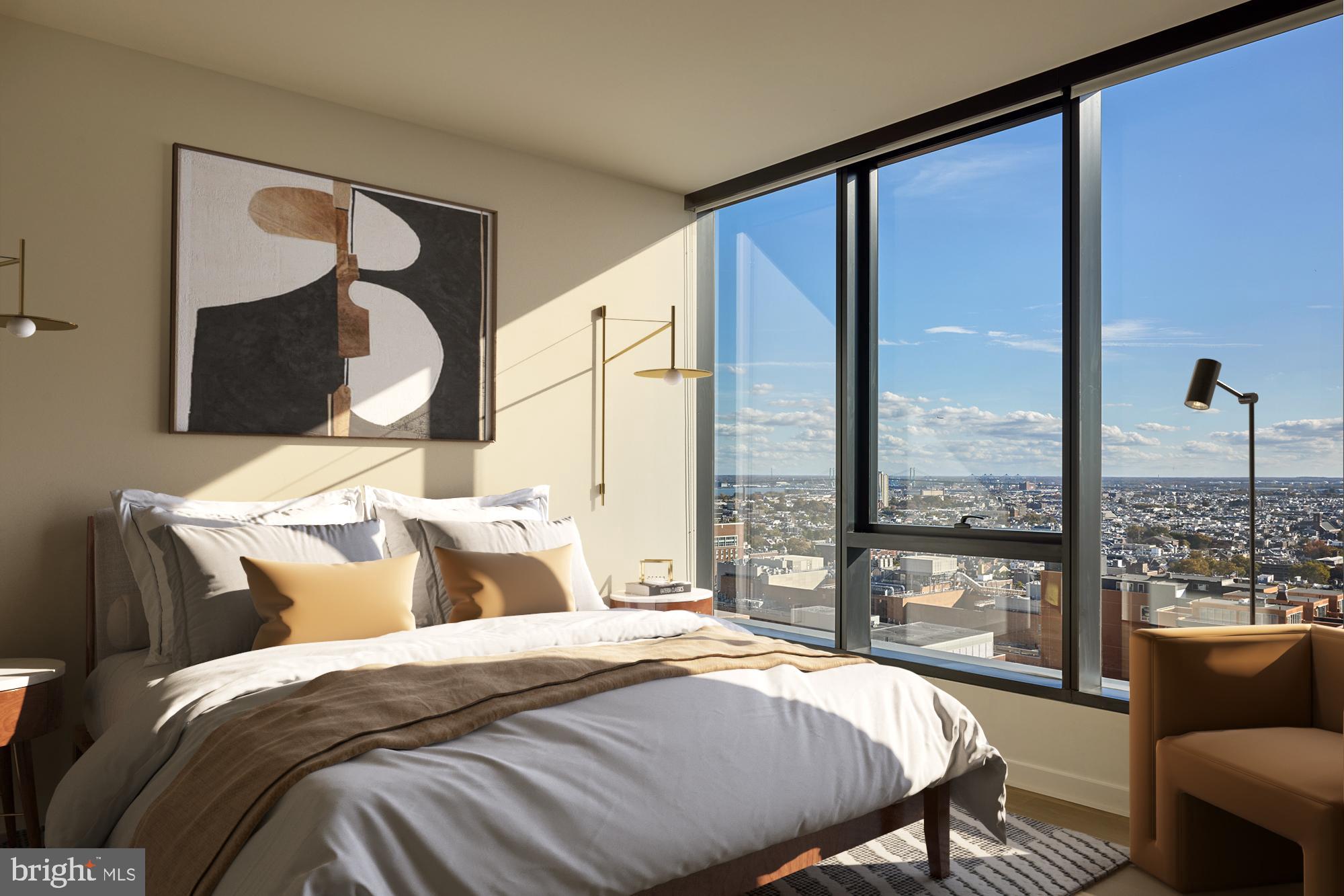 1134 Sansom Street, Unit 2B1708 Philadelphia, PA 19107 - Photo 32 of 33 a bedroom with a bed and a window