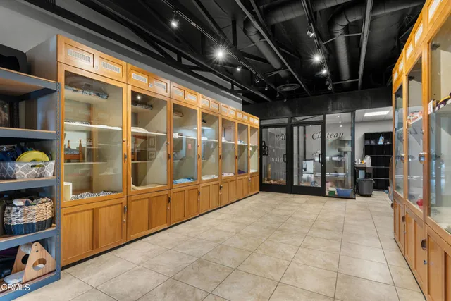 a swimming pool with an outdoor seating