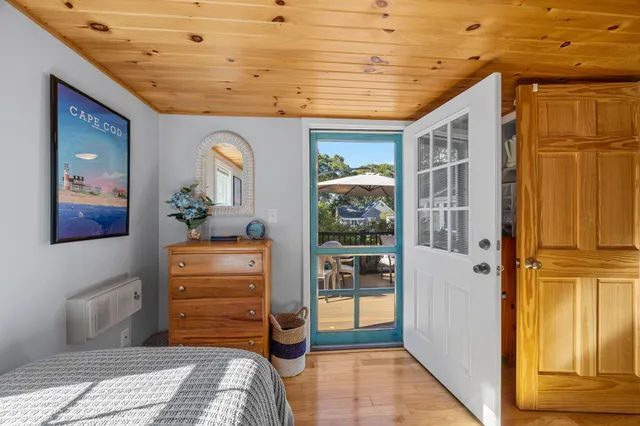 a bedroom with furniture and window