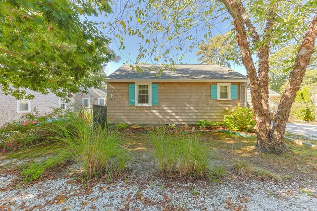 a backyard of a house with lots of green space