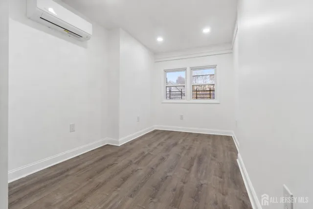 a view of small space with wooden floor