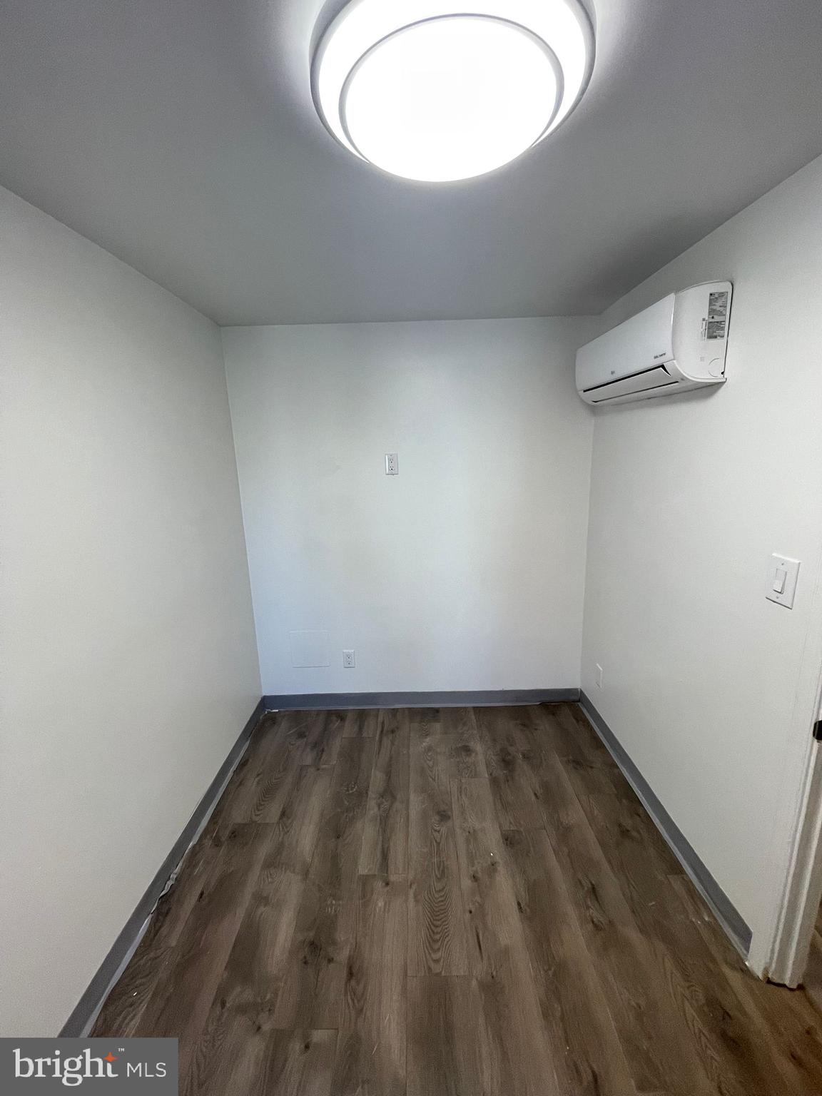 4511 Laird Street Philadelphia, PA 19139 - Photo 9 of 20 a view of a room with wooden floor and a window