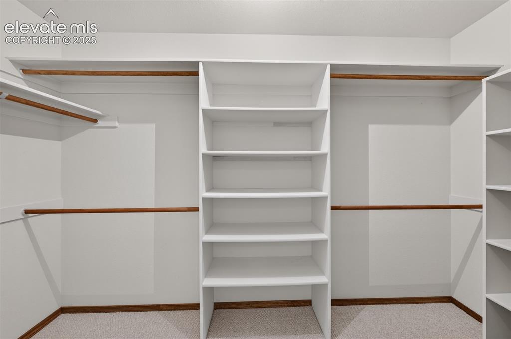 155 Pontiac Loop Monument, CO 80132 - Photo 28 of 50 Bedroom/Office Walk-In Closet