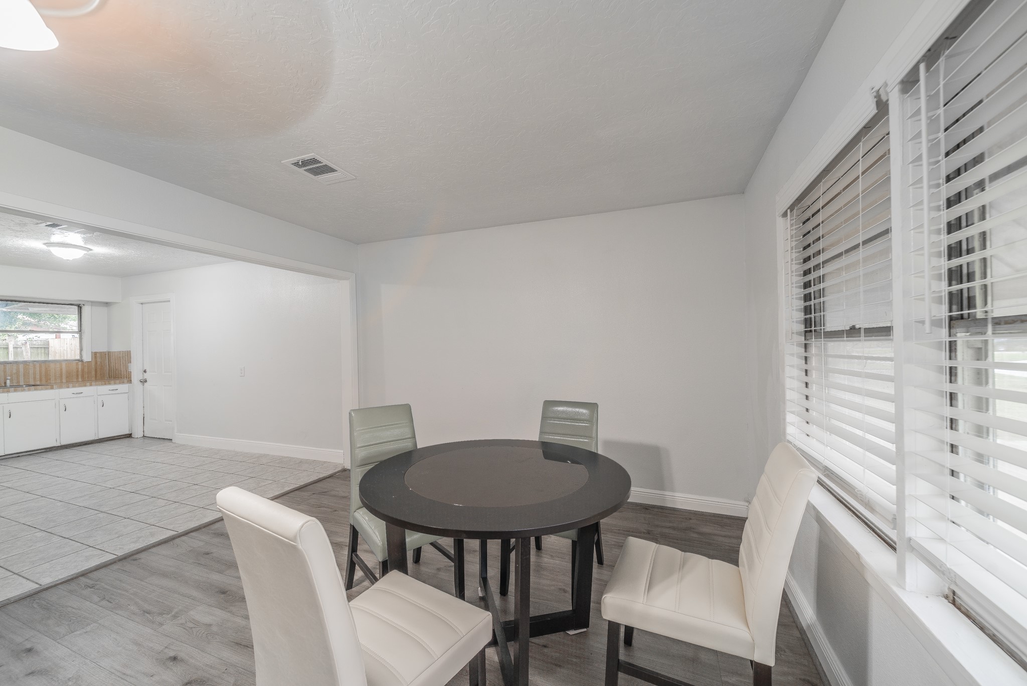 415 Gober Street Houston, TX 77017 - Photo 4 of 12 a view of a room that has a table and chair in it