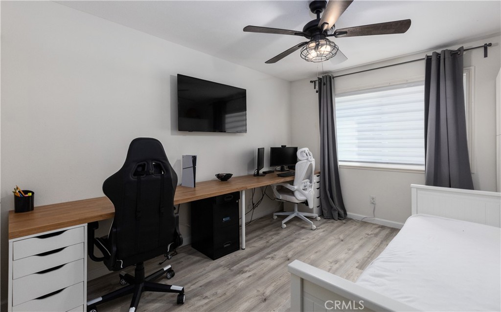 12200 Montecito Road, Unit D104 Seal Beach, CA 90740 - Photo 12 of 25 a view of a workspace with furniture and a window
