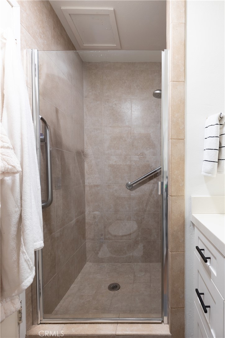 12200 Montecito Road, Unit D104 Seal Beach, CA 90740 - Photo 18 of 25 a bathroom with a shower