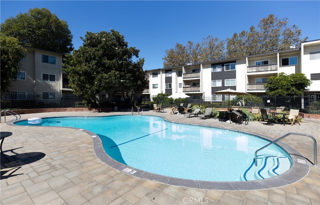 12200 Montecito Road, Unit D104 Seal Beach, CA 90740 - Photo 21 of 25 a view of a swimming pool with a patio