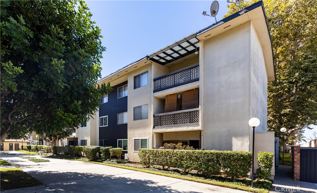 12200 Montecito Road, Unit D104 Seal Beach, CA 90740 - Photo 23 of 25 a view of road with building and trees