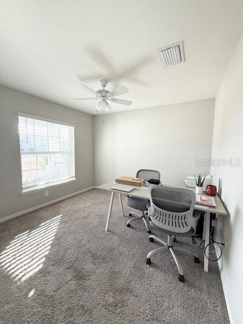 5497 Southeast 91st Street Ocala, FL 34480 - Photo 20 of 29 a view of a workspace with furniture and a window