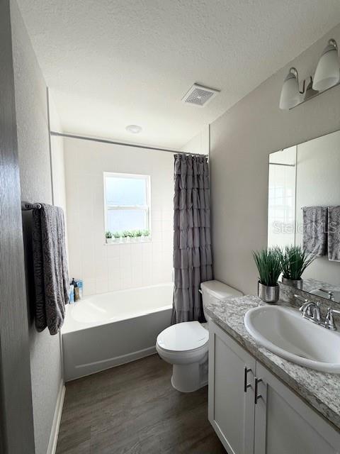 5497 Southeast 91st Street Ocala, FL 34480 - Photo 23 of 29 a bathroom with a granite countertop sink toilet and shower