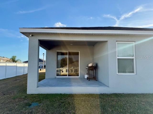 5497 Southeast 91st Street Ocala, FL 34480 - Photo 25 of 29 a front view of a house with a yard