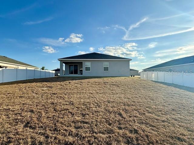 5497 Southeast 91st Street Ocala, FL 34480 - Photo 27 of 29 a view of a backyard