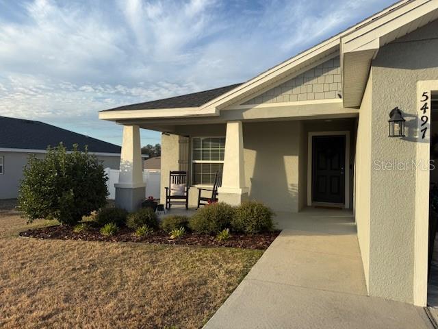 5497 Southeast 91st Street Ocala, FL 34480 - Photo 4 of 29 a front view of house with yard