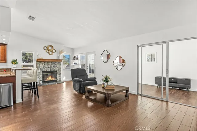 a bedroom with a bed and a ceiling fan