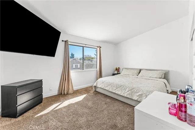 a utility room with sink dryer and washer
