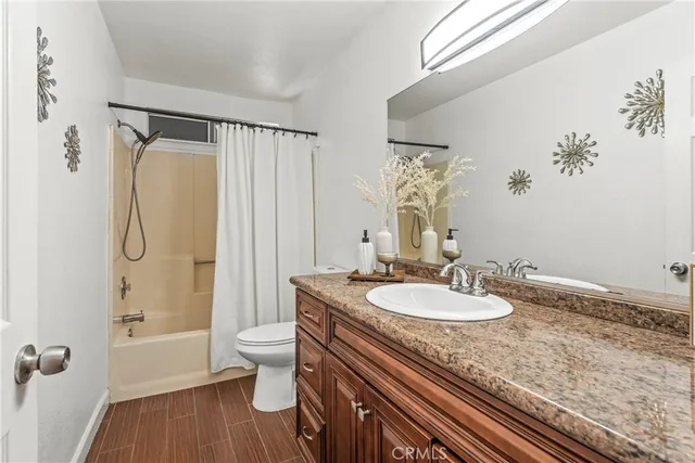 a view of a backyard with sitting area and furniture