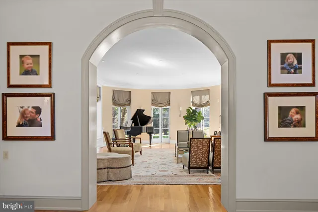 a view of a living room and dining room
