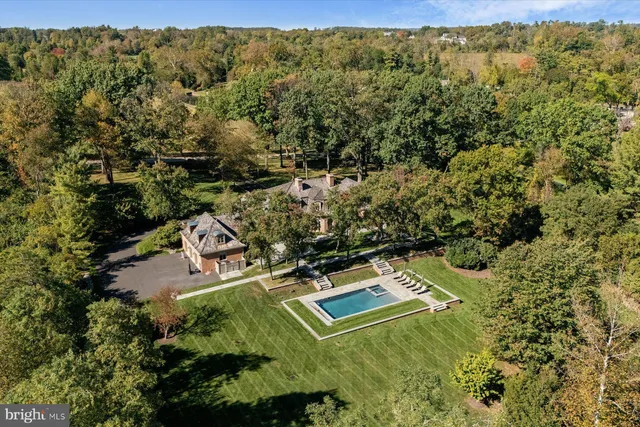 an aerial view of residential house with outdoor space