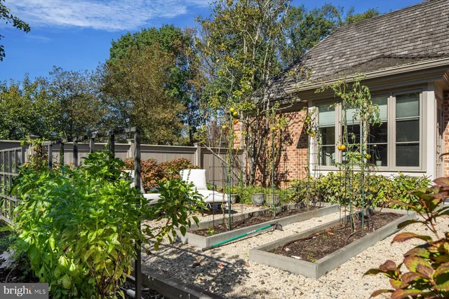 a view of a swimming pool and a yard